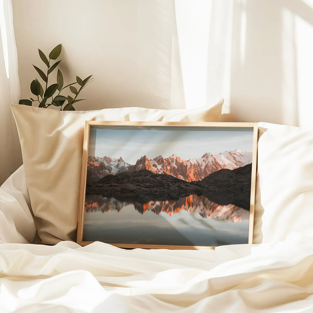 Scenic mountain wall art from the French Alps with a perfect alpine lake reflection at golden hour.