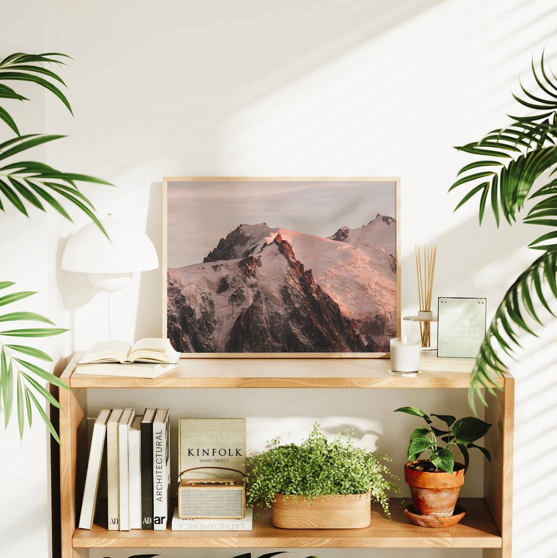 Stunning wall art print showing snow-covered alpine peaks glowing pink at dusk in the Chamonix region.