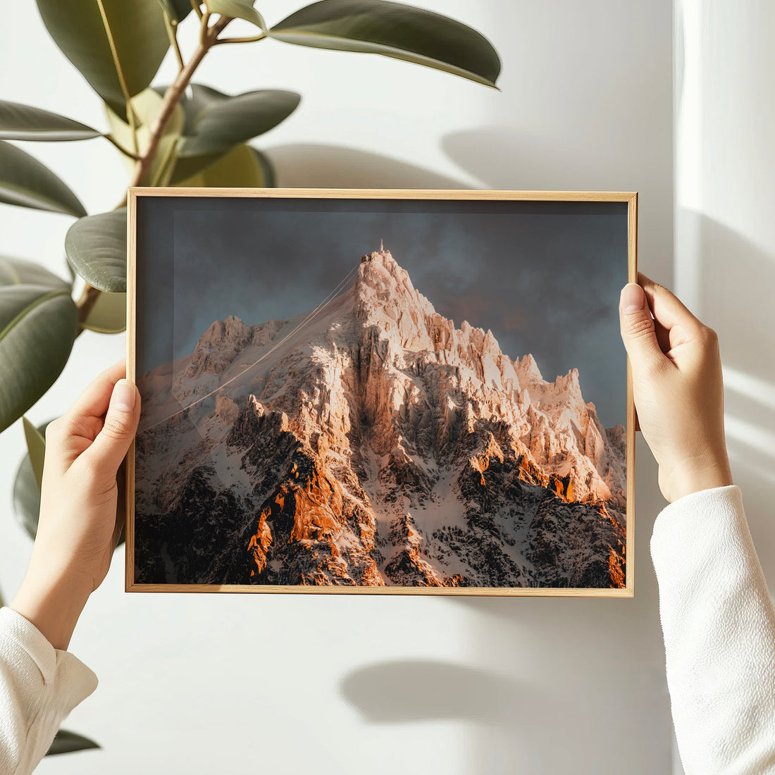 Snow-covered peak of the French Alps at sunrise, featuring Aiguille du Midi in stunning wall art photography.