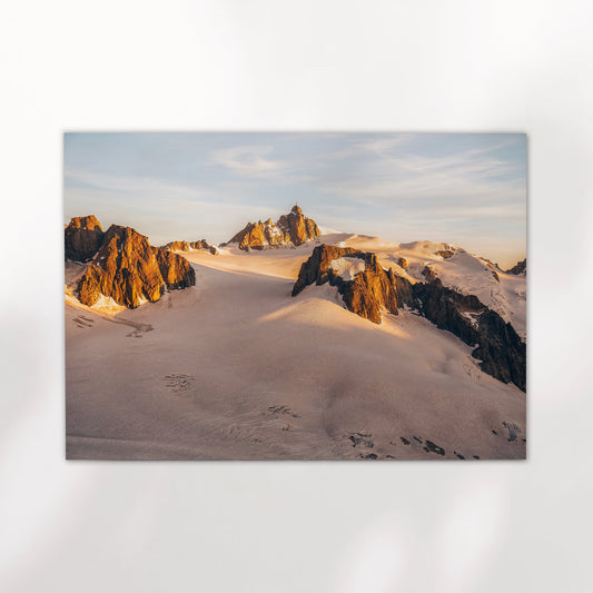 Fine art photo print of the French Alps with dramatic sunset hues over Aiguille du Midi near Chamonix.