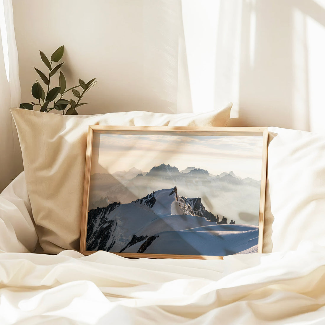 Winter landscape print of Mont Maudit near Chamonix with sunlit snow slopes and distant alpine silhouettes.