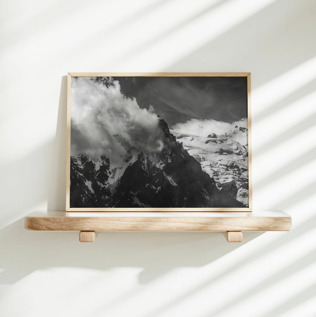 Glacier-covered French Alps print in black and white, featuring Aiguille du Midi under a stormy sky.