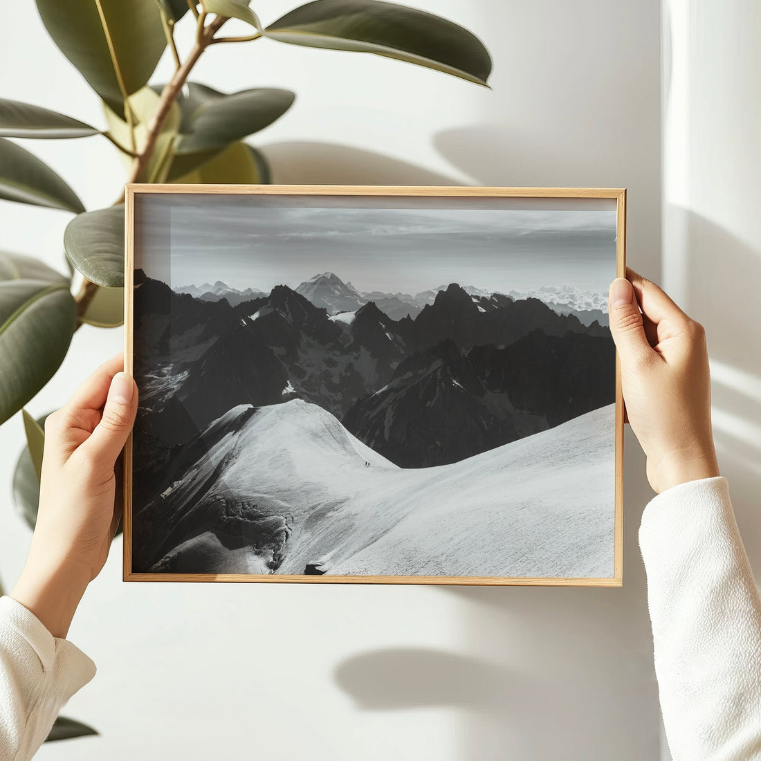 Glacier hiking photo print of two climbers ascending snowy ridges above Chamonix in the Mont Blanc range.