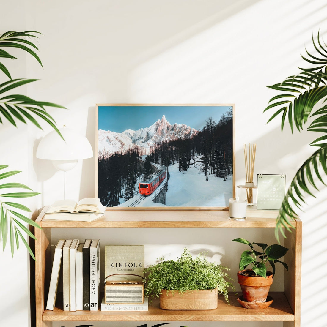 French Alps wall art print of a glacier train snaking through frosty pine trees beneath Mont Blanc.