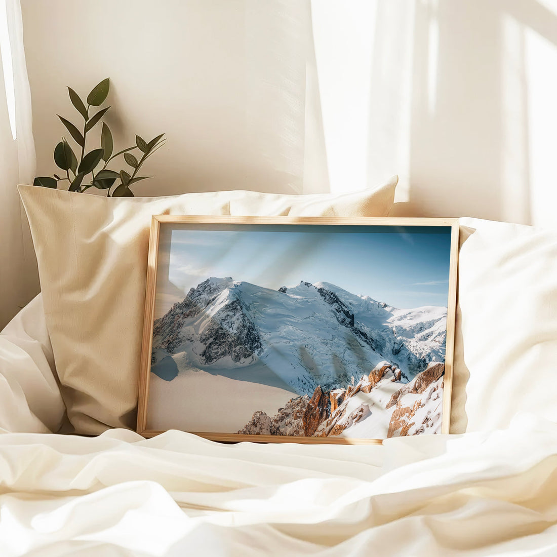 Framed glacier wall art print of the Mont Blanc range and Cosmiques ridge in perfect winter light.