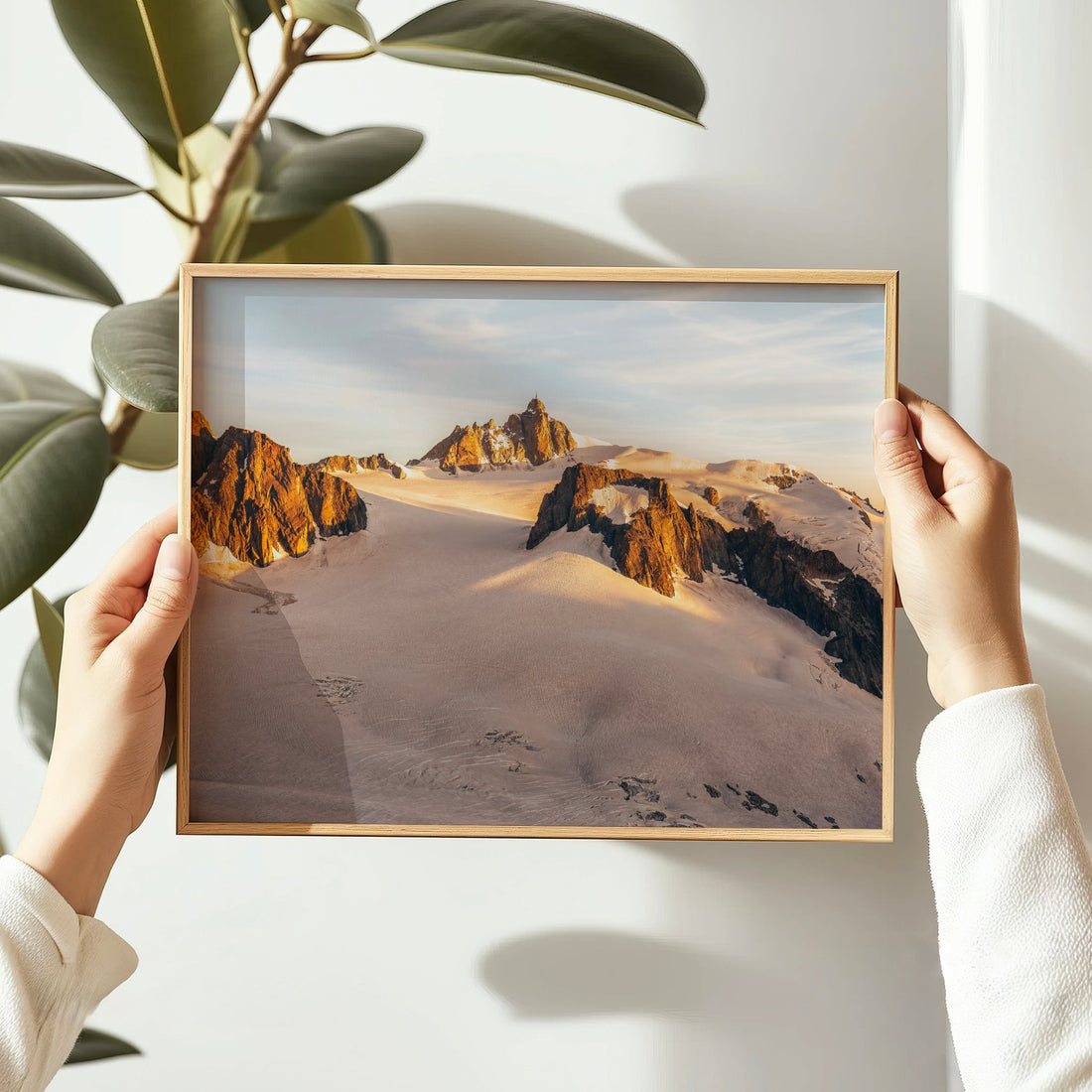 Golden hour Alps wall art capturing soft light across glacier-covered ridgelines in the Mont Blanc massif.
