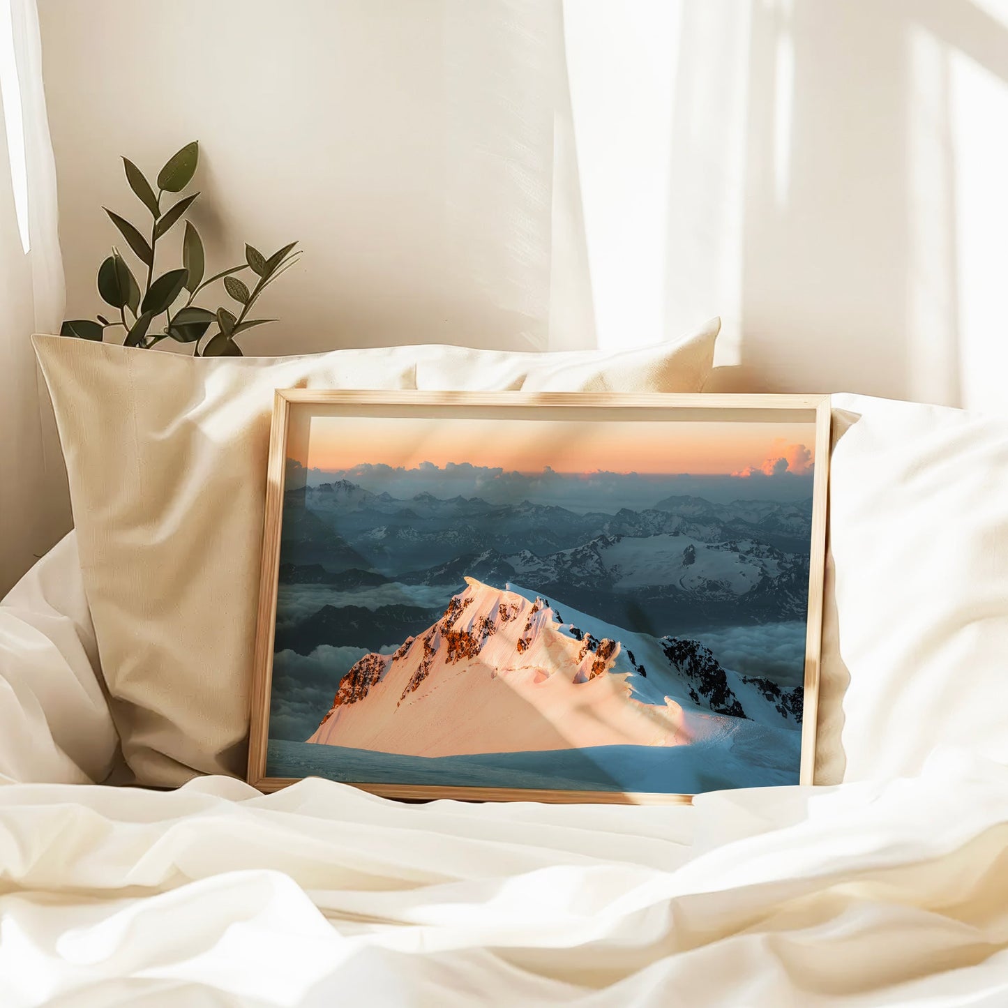 Photography wall art of Monte Bianco glowing in golden light above a sea of clouds, captured from the summit.