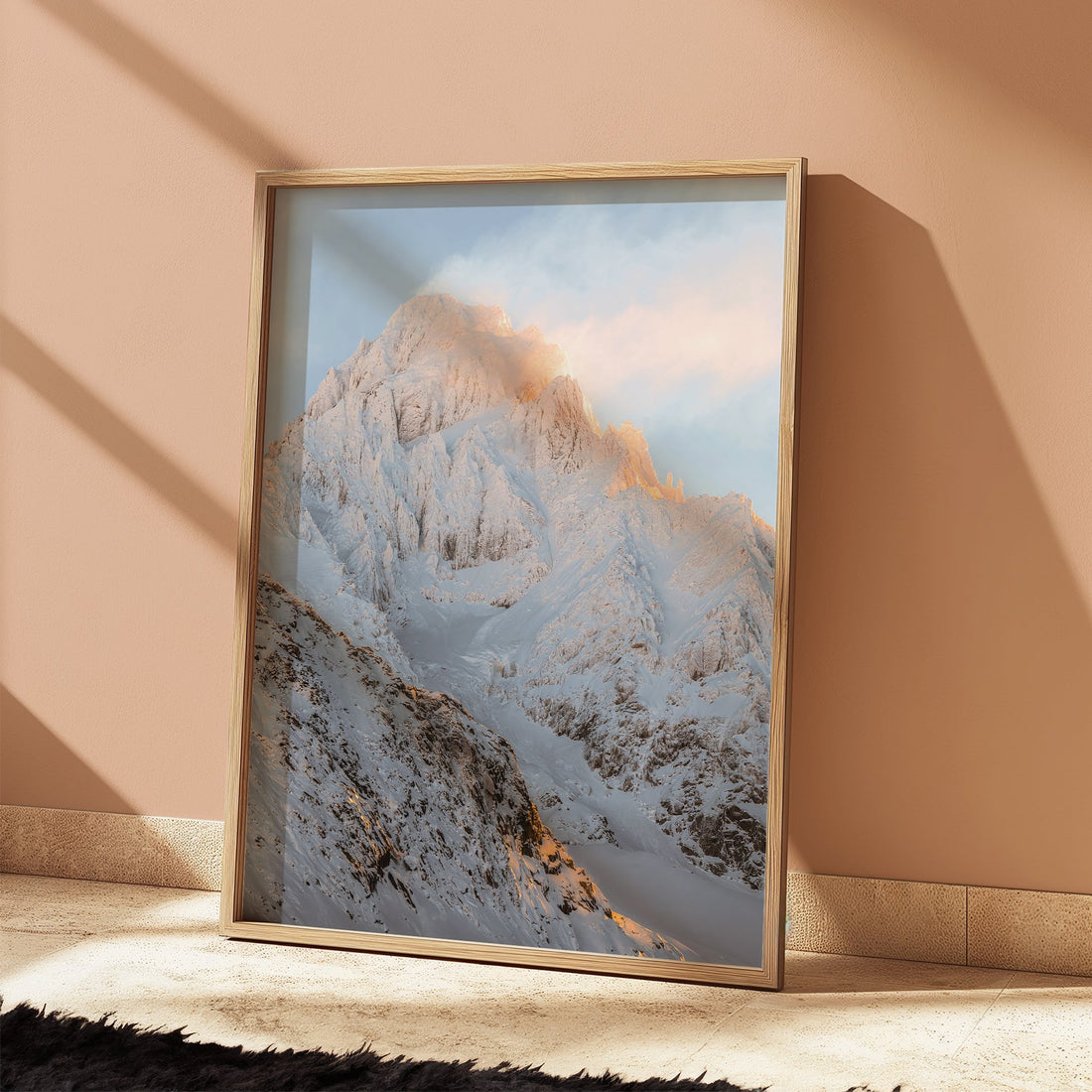 Scenic mountain wall art print capturing the golden light over Aiguille du Chardonnet’s snow-clad ridges.