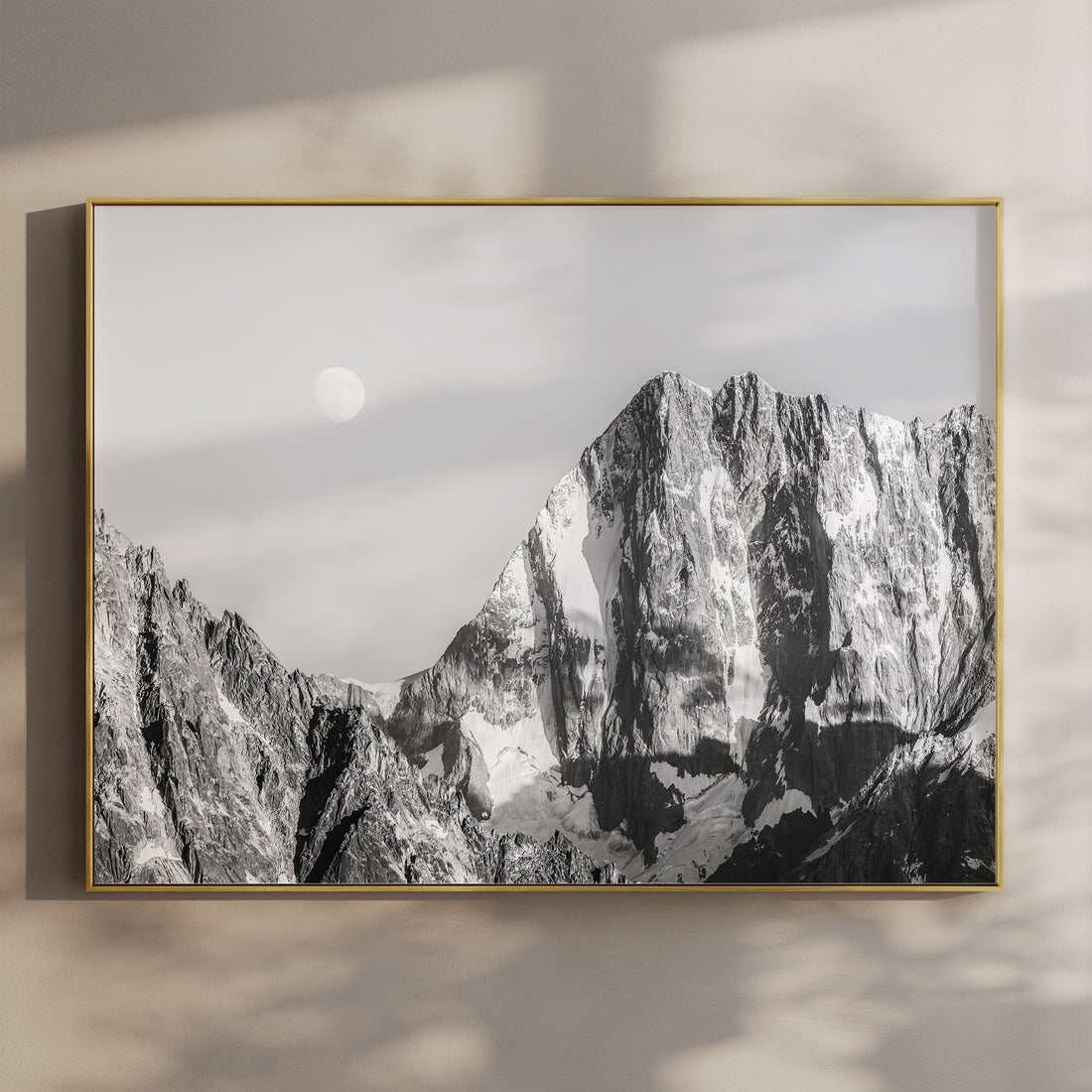 Black and white wall art print of Grandes Jorasses with the moon rising over the rugged alpine peaks in Chamonix.