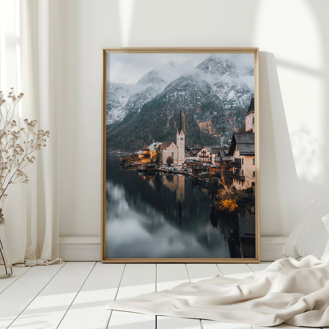 Bright room with Hallstatt print of Austria's alpine lake town