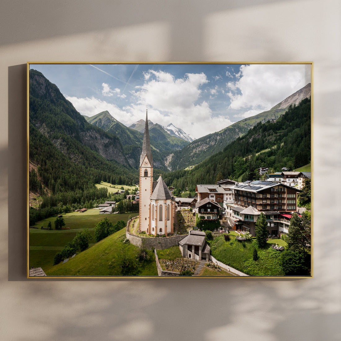 Heiligenblut church with alpine mountains and Grossglockner in the background