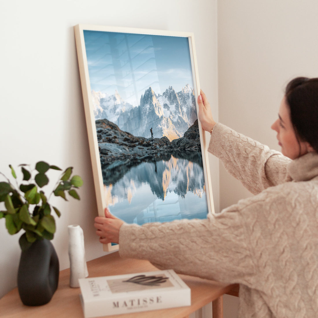 A high-altitude lake in the French Alps, mirroring the jagged mountain skyline in this fine art print.