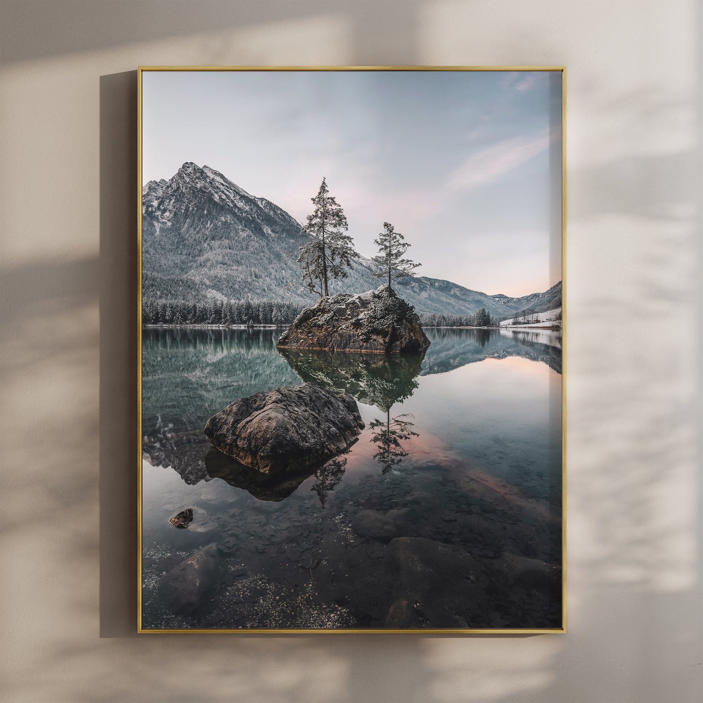 Peaceful morning reflections on Hintersee lake in the Bavarian Alps