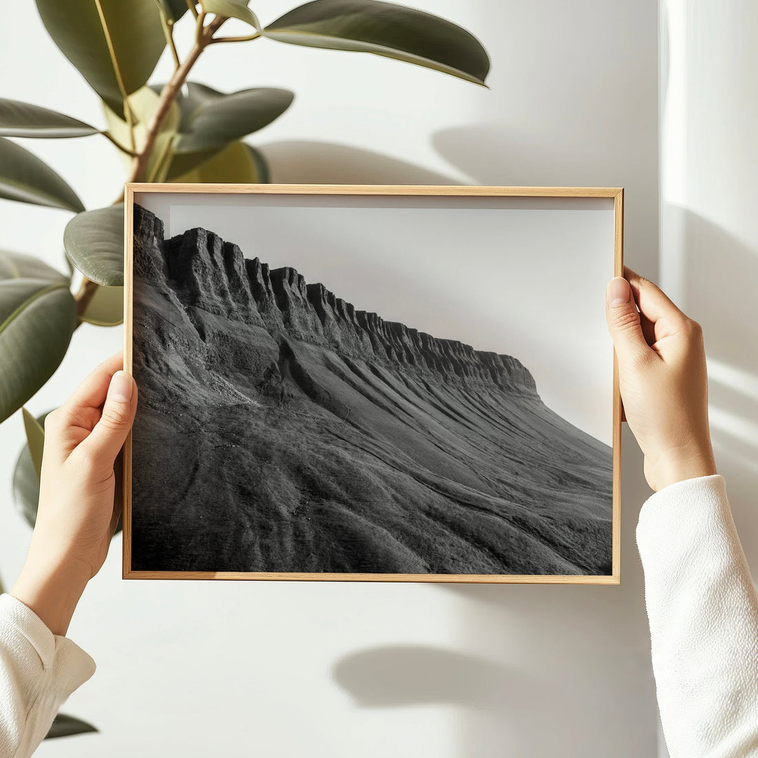 Hands holding framed Benbulbin black and white Irish photography print