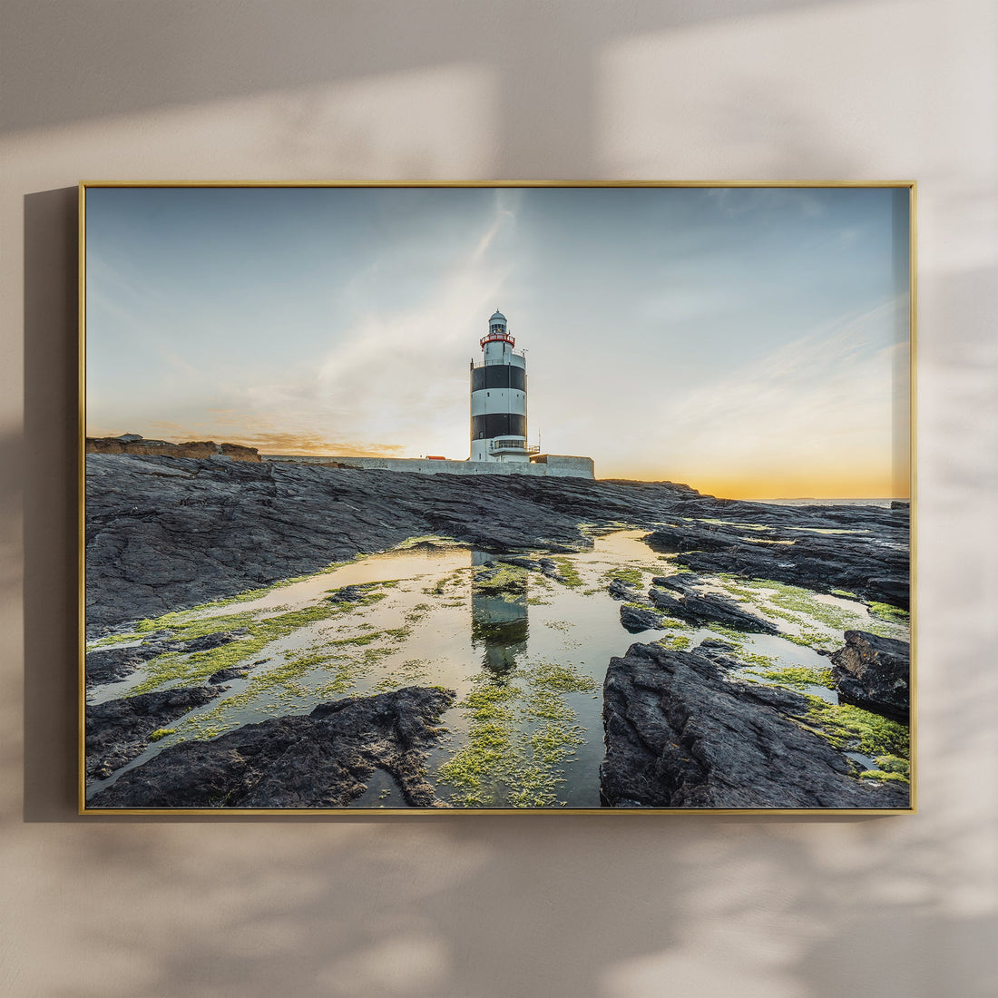 Hook Head Lighthouse print styled as natural bedroom wall decor.