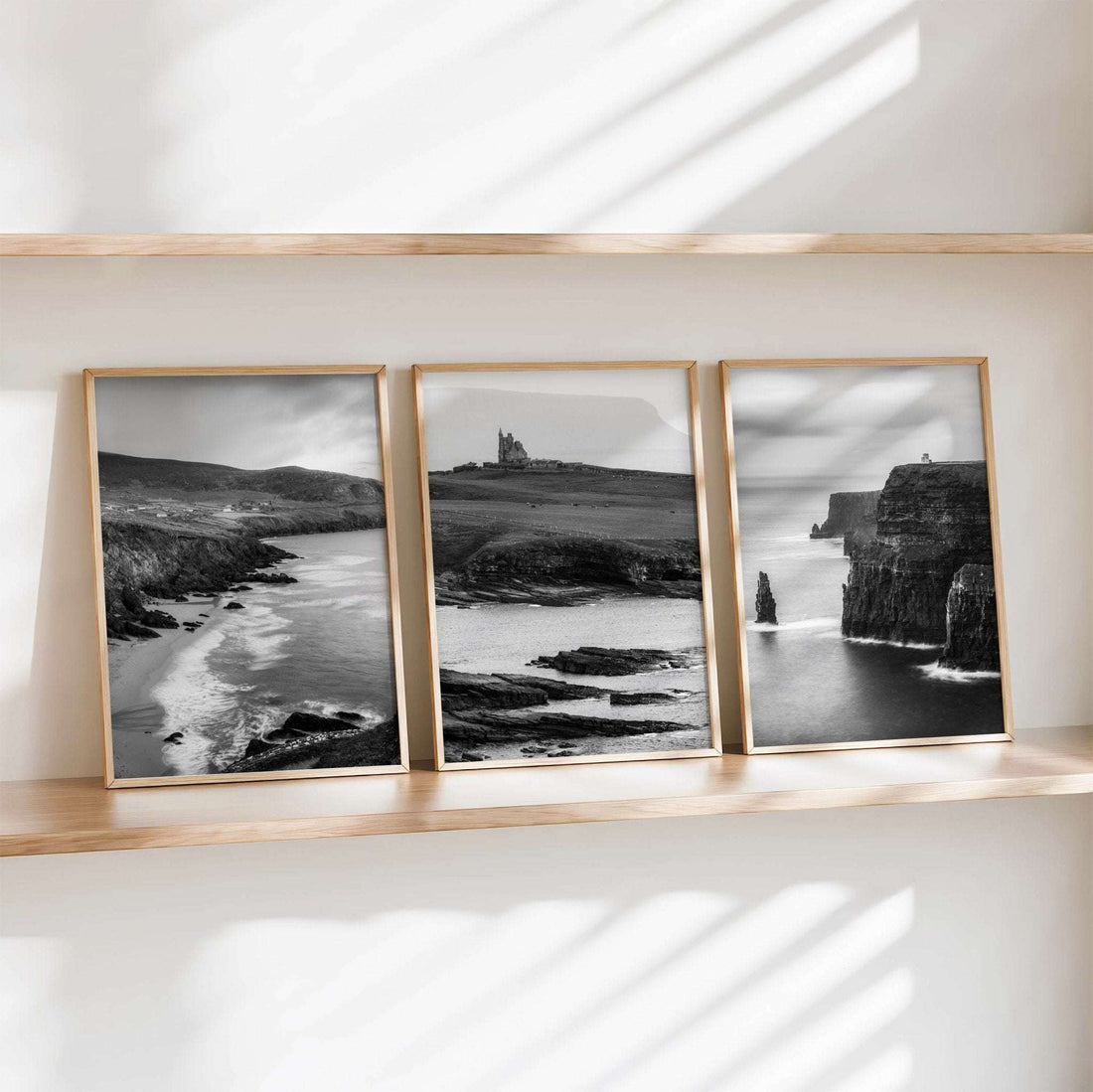 Ireland coastal landscape triptych in black and white featuring dramatic cliffs and shoreline scenes