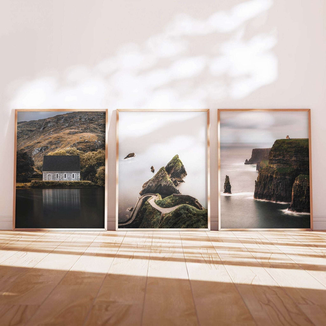 Irish coastal wall art set of three fine art photography prints in a bright interior setting