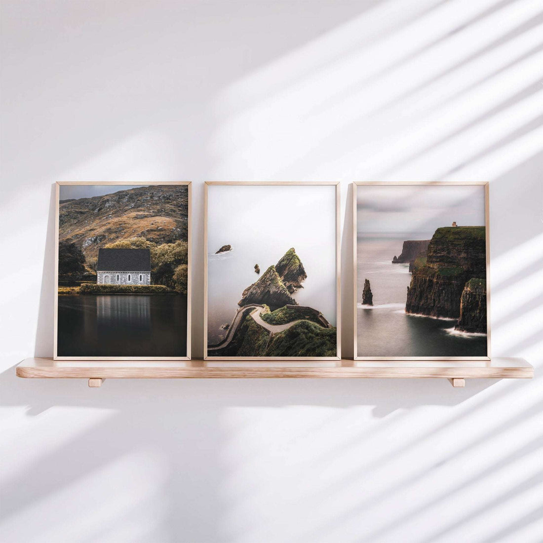 Framed Irish landscape wall art set of three prints displayed together in a modern interior