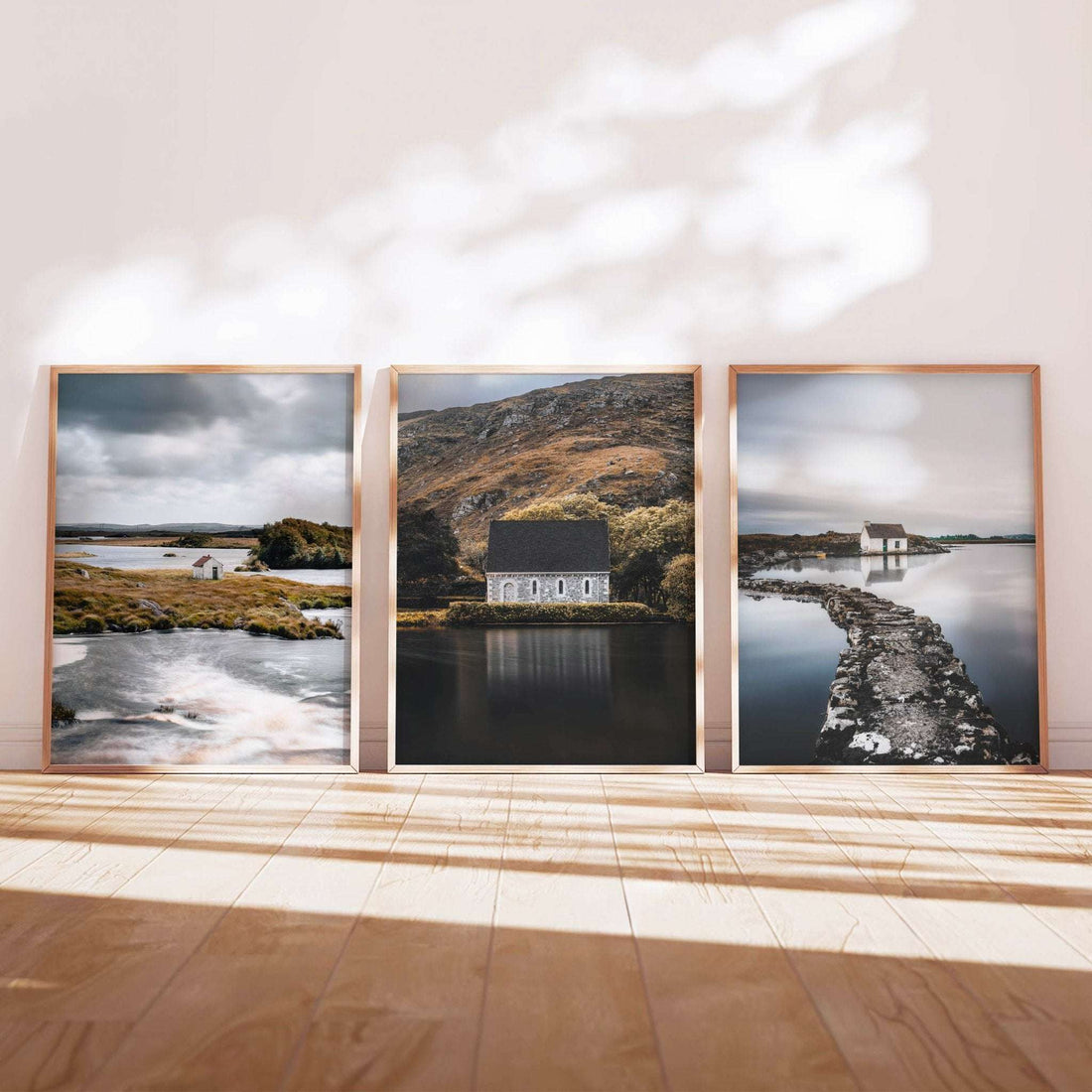 Irish wall art set of three displayed in a bright interior with natural light, showing Connemara countryside and coastal scenes