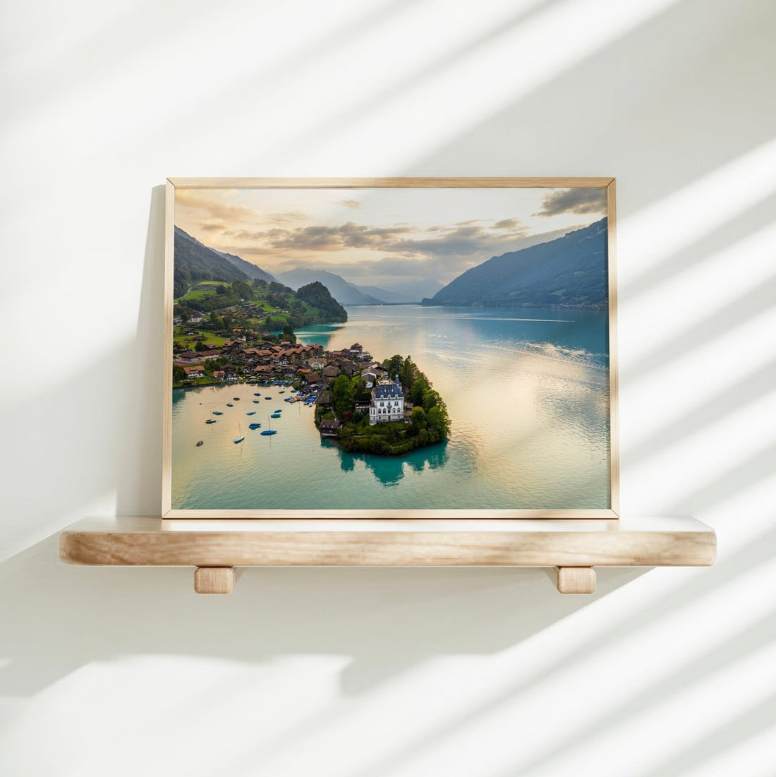 Aerial landscape shot of Iseltwald on Lake Brienz, Switzerland, capturing the beauty of this Swiss alpine paradise.