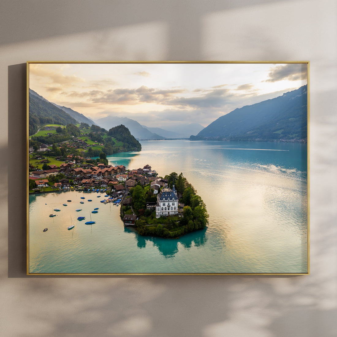 A breathtaking sunset view over Iseltwald on Lake Brienz, Switzerland, with turquoise waters and alpine scenery.