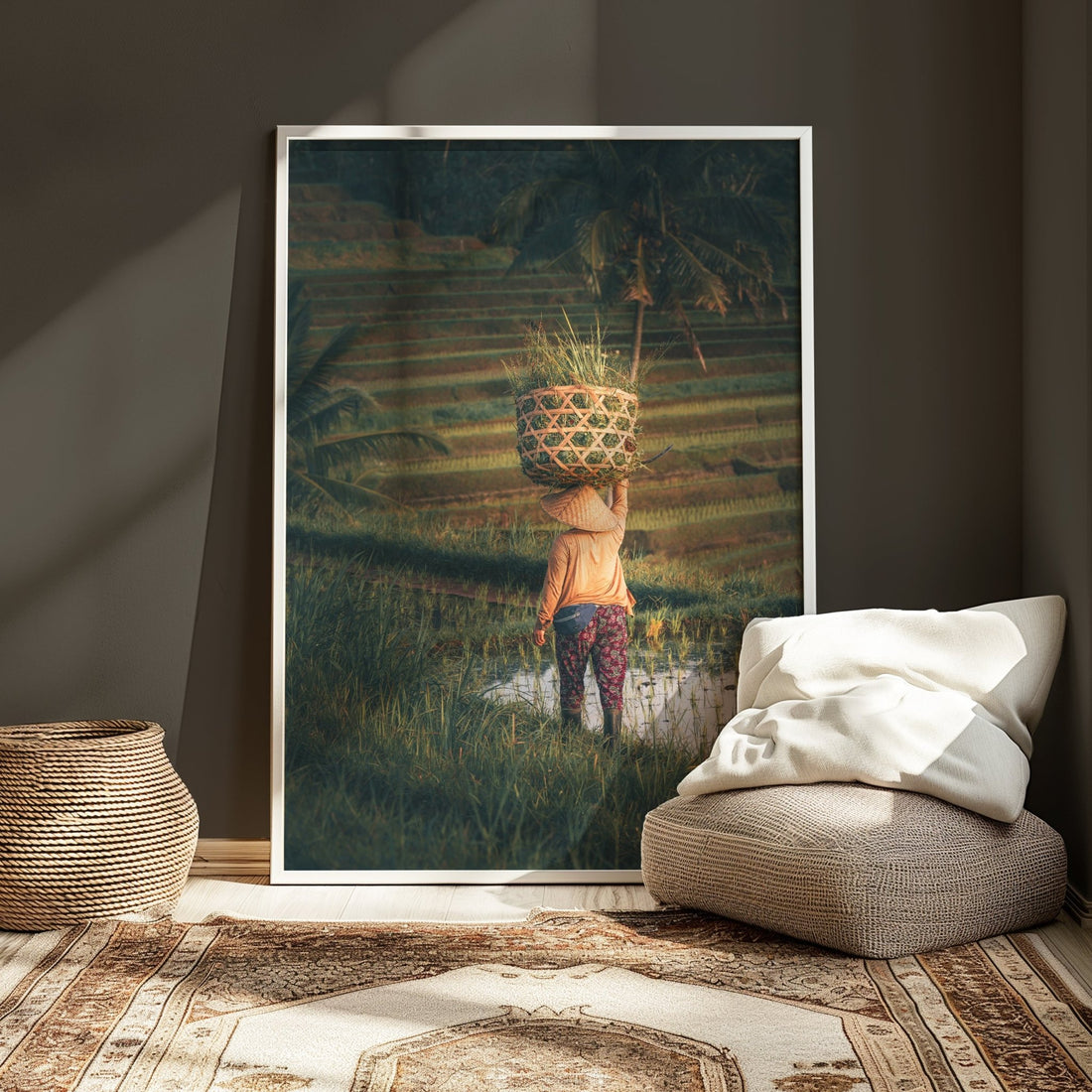 Framed Jatiluwih Rice Fields photography print leaning on wall in cozy room
