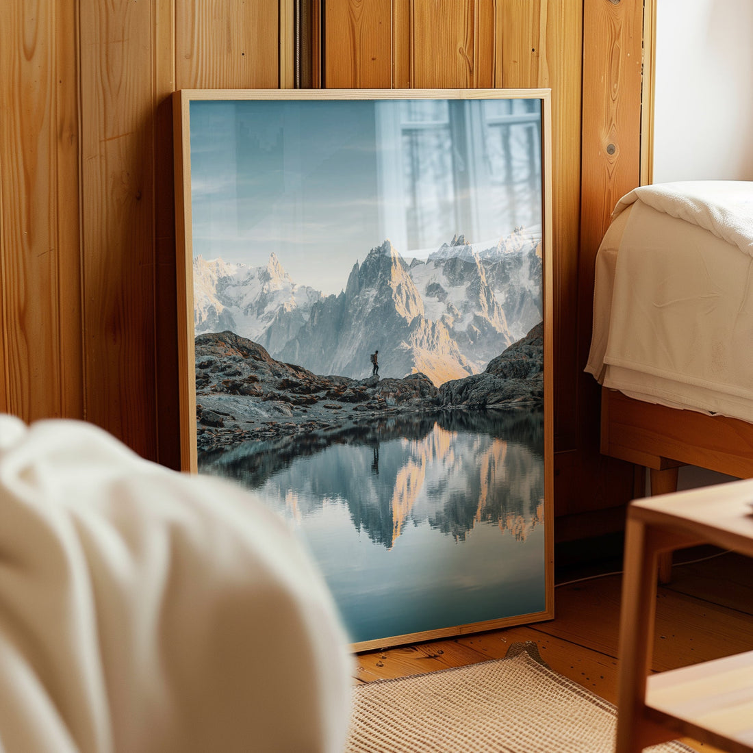 Sunset glow over Lac Blanc, with the snow-covered Mont Blanc massif reflecting in the still waters.