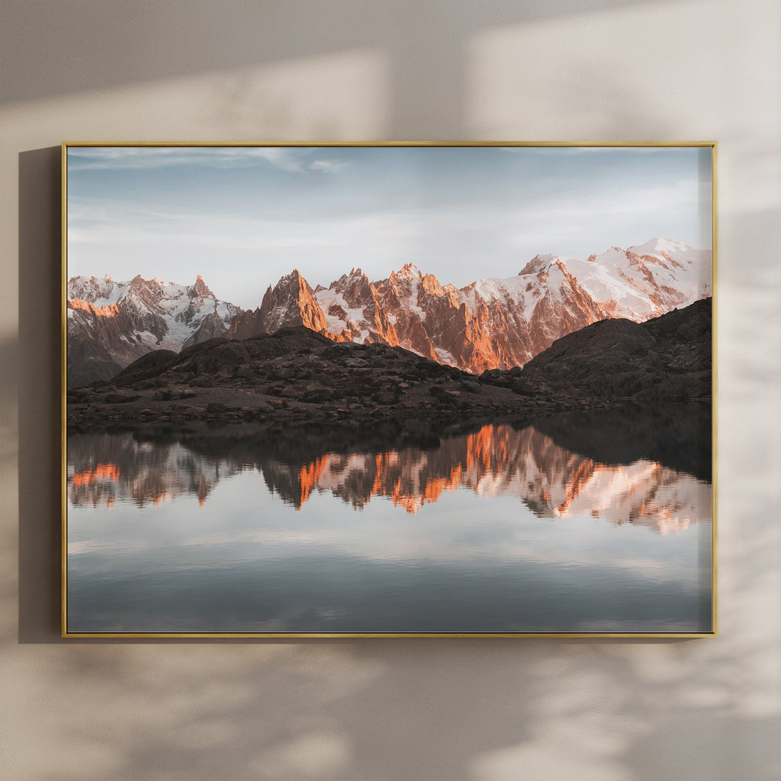Serene Mont Blanc wall art print showing Lac Blanc at sunrise with glowing peaks reflected in still alpine waters.