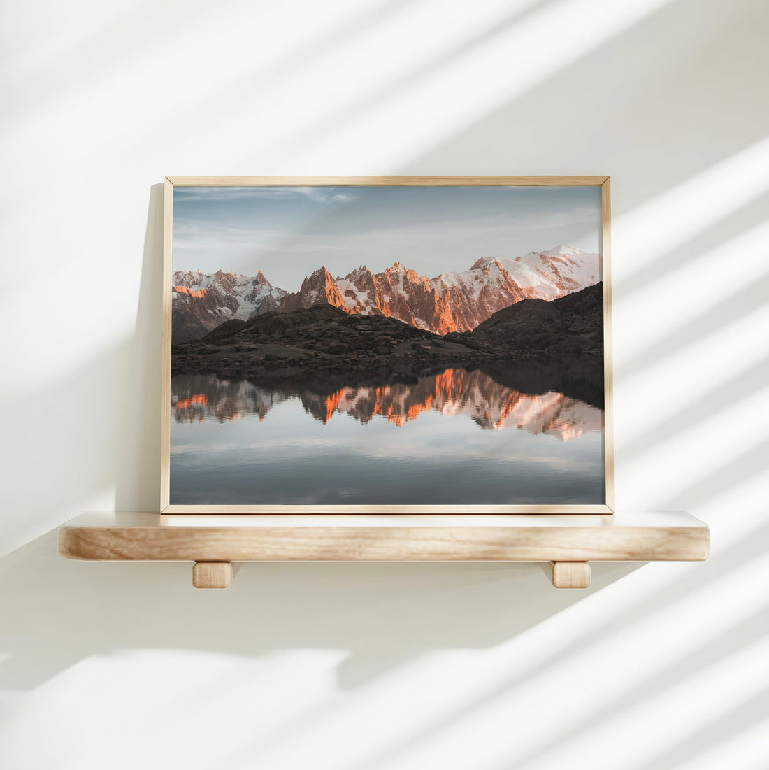Fine art print of Lac Blanc near Chamonix, glowing mountain tops and glassy lake captured in stunning detail.