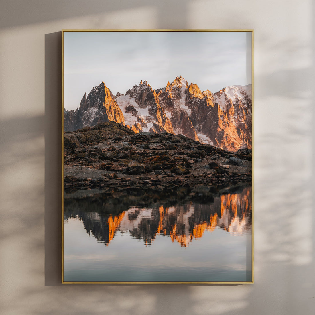 Stunning sunset over Lac Blanc with Mont Blanc peaks reflecting in the alpine lake. A perfect Chamonix wall art print.