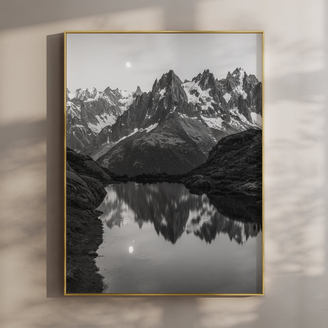 Stunning black and white print of Lac de la Flégère reflecting the jagged peaks of the Aiguilles Rouges.