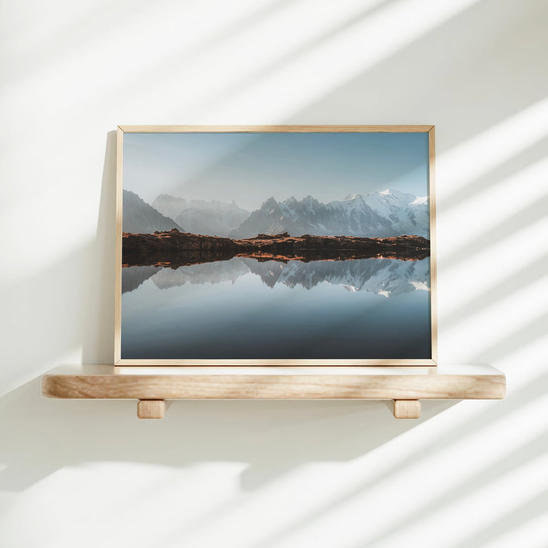 Minimalist mountain wall decor of Mont Blanc’s peaks reflected perfectly at Lacs des Chéserys in the French Alps.