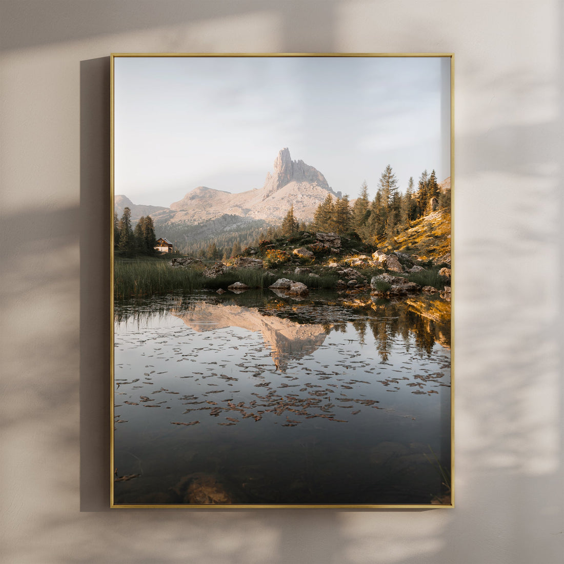 Fine art landscape print of Lago di Federa in the Dolomites with mountain reflections and golden light at sunrise.