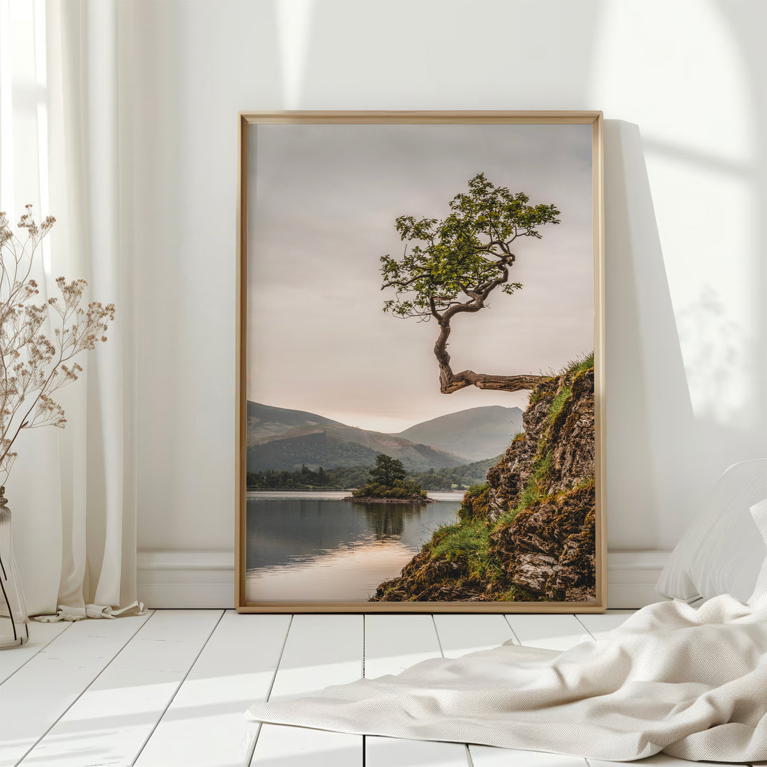 Nature print of tree over Derwentwater in a soft-lit Scandinavian-style room