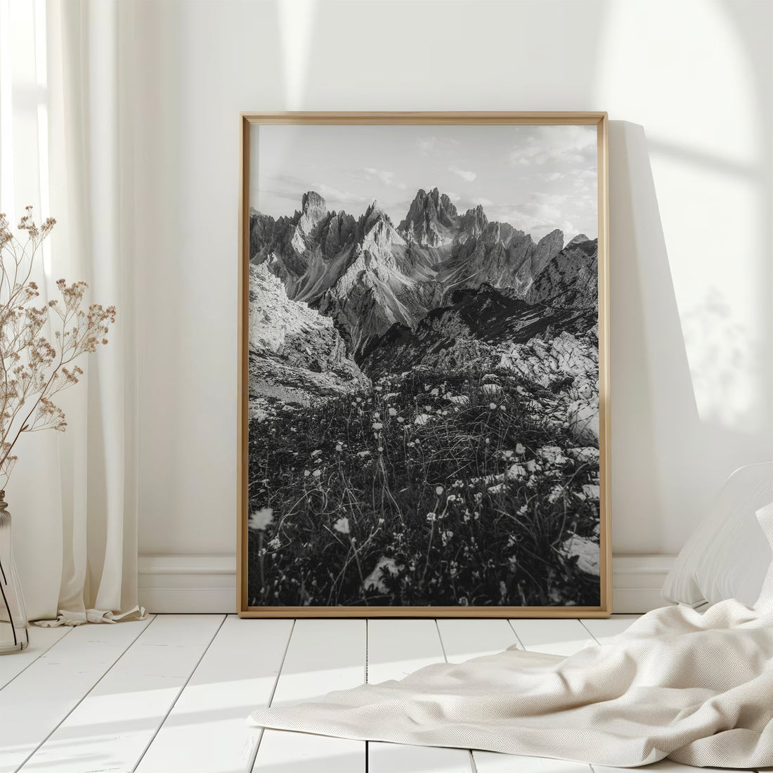 Large-format black and white Dolomites print of Cadini di Misurina styled in a soft white space.