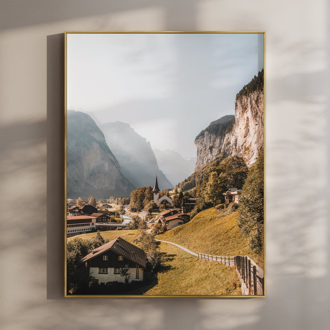 Stunning Lauterbrunnen Valley wall art print featuring Swiss alpine houses and dramatic cliffs.