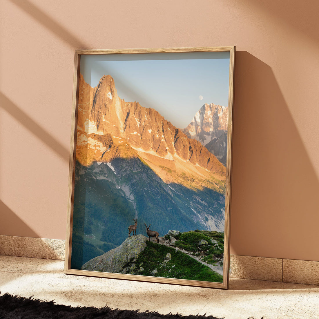 Les Drus mountain sunset wall art print capturing a dreamy alpine scene with ibex grazing on the ridge.