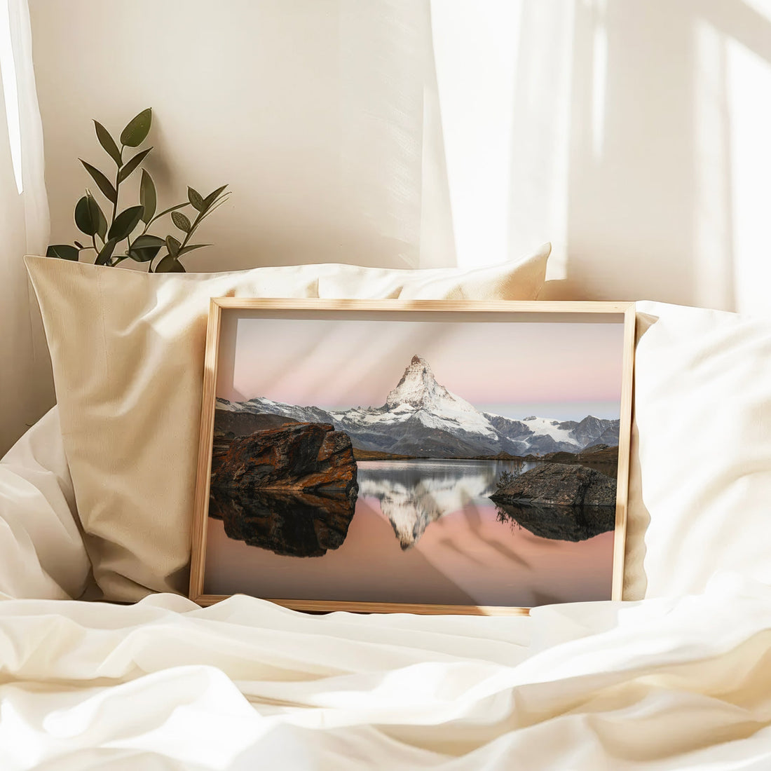 Swiss Alps artwork with the Matterhorn under a dreamy pink sky reflected in Stellisee’s glassy surface.