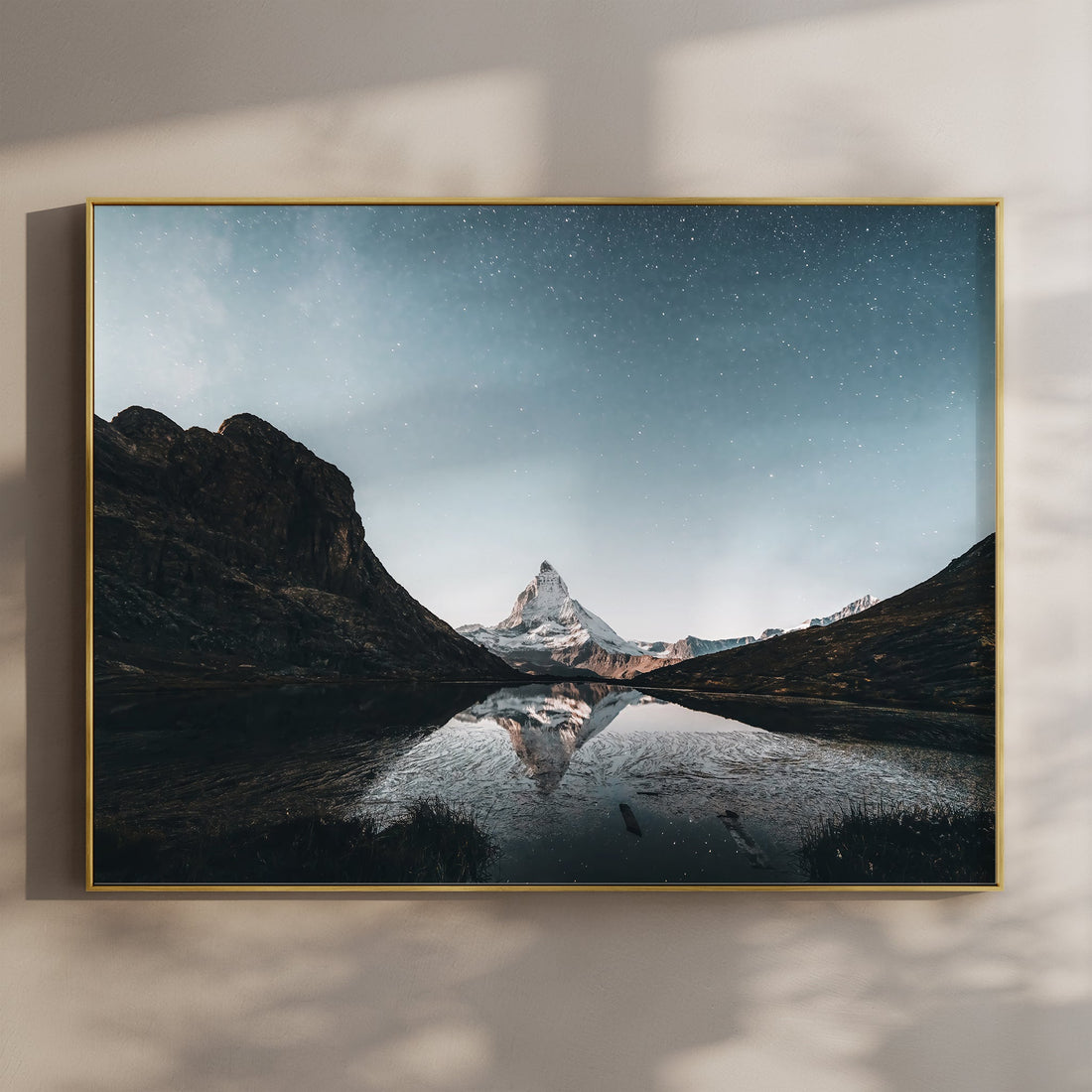 Stunning Matterhorn reflection in Riffelsee under a starry Swiss Alps night sky. A must-have fine art print.