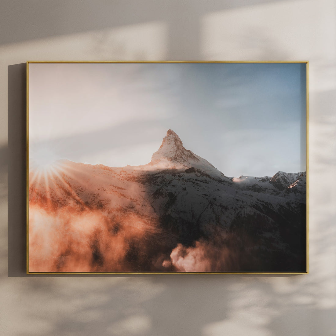 Breathtaking Matterhorn sunset wall art print featuring glowing clouds over the Swiss Alps.
