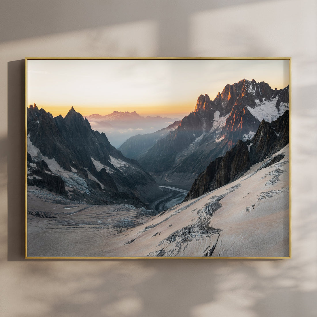 Fine art landscape print of the Mer de Glace glacier at sunrise, with rugged alpine peaks near Chamonix, France.