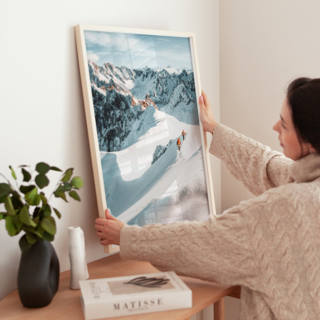 A stunning alpine photography print of climbers braving the snowy heights of Midi Arête in Mont Blanc.