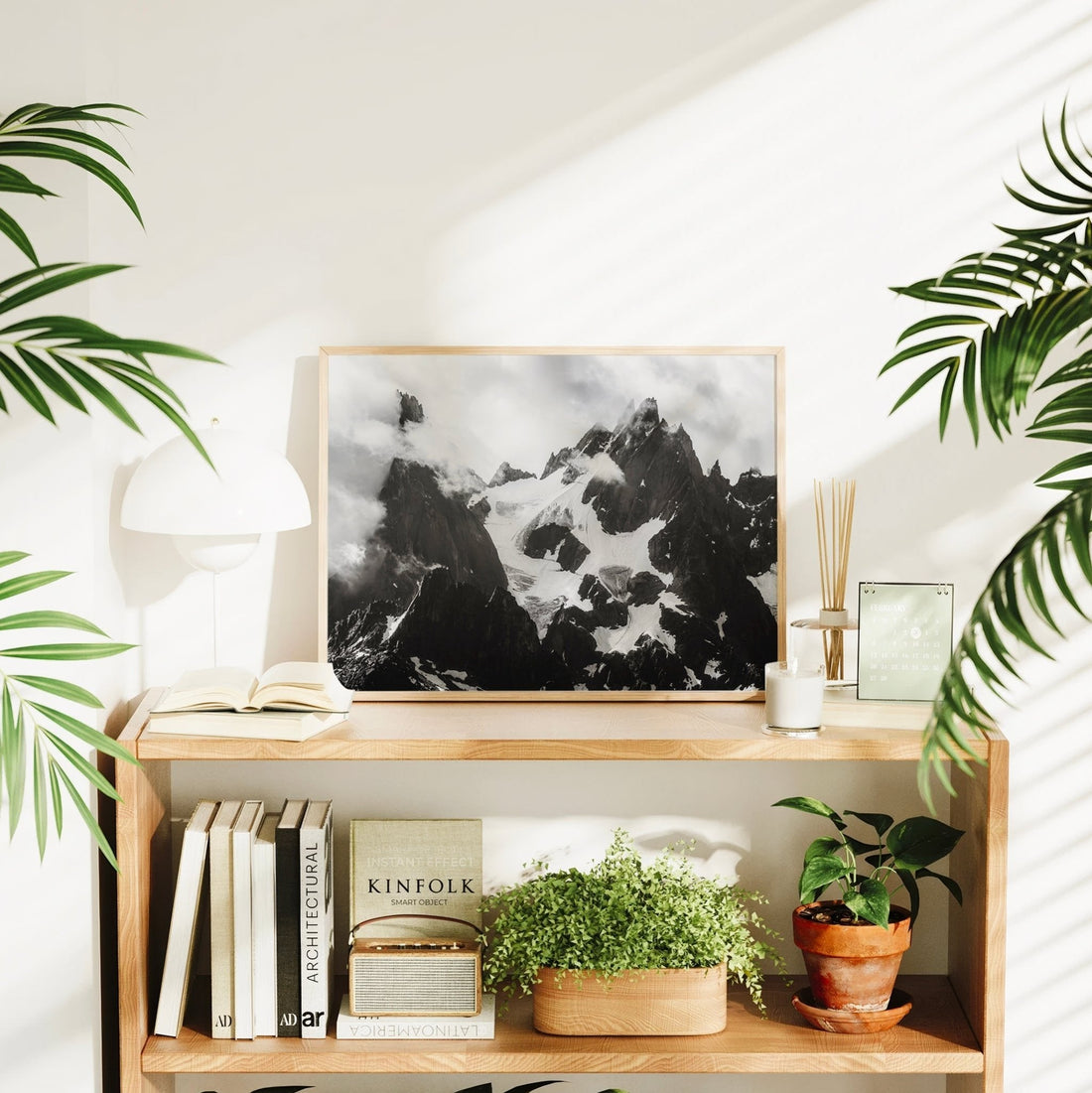 Contemporary glacier art print of the Chamonix Aiguilles in stunning monochrome with textured snow and stone.