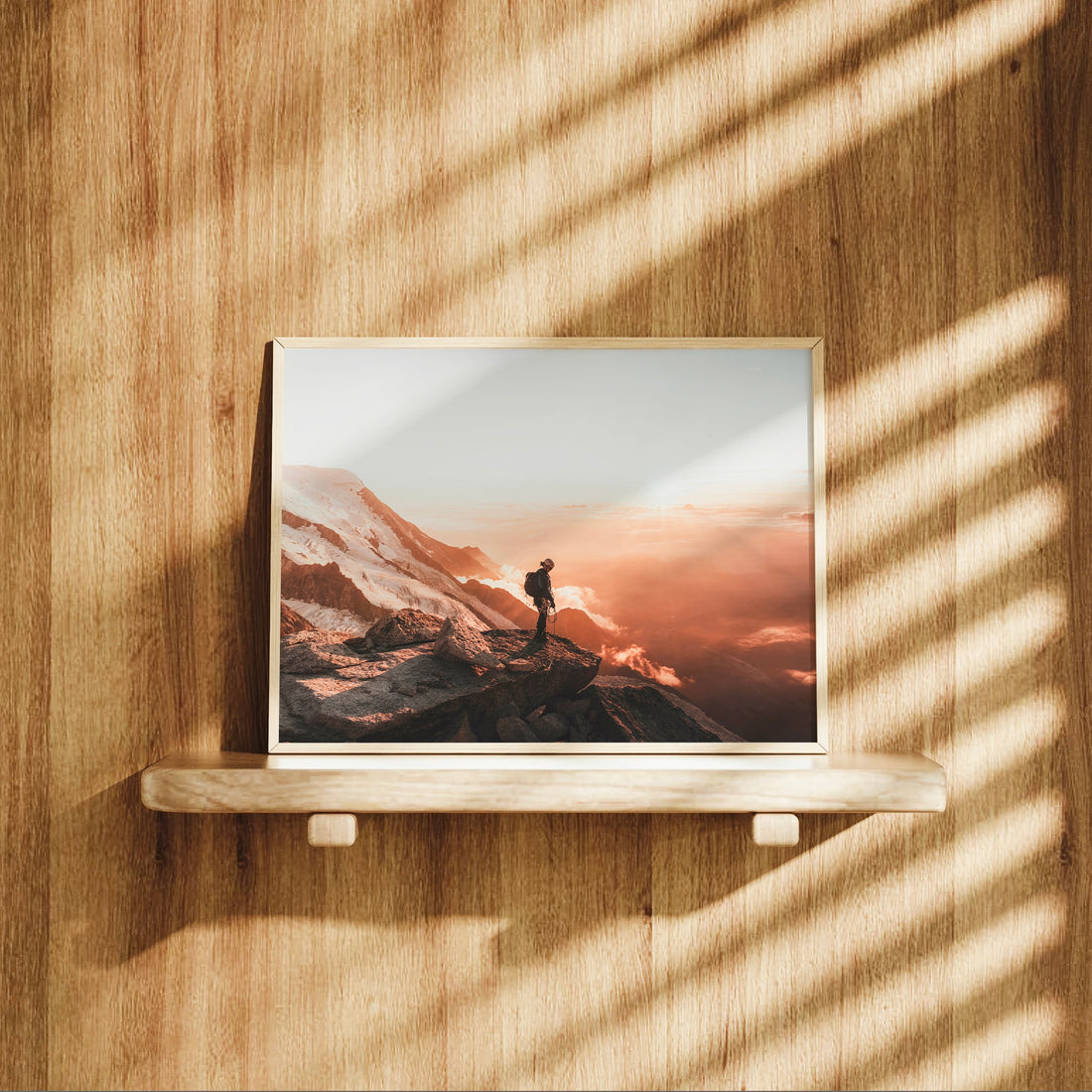 Striking Mont Blanc glacier climbing art print featuring a lone explorer standing above the clouds.