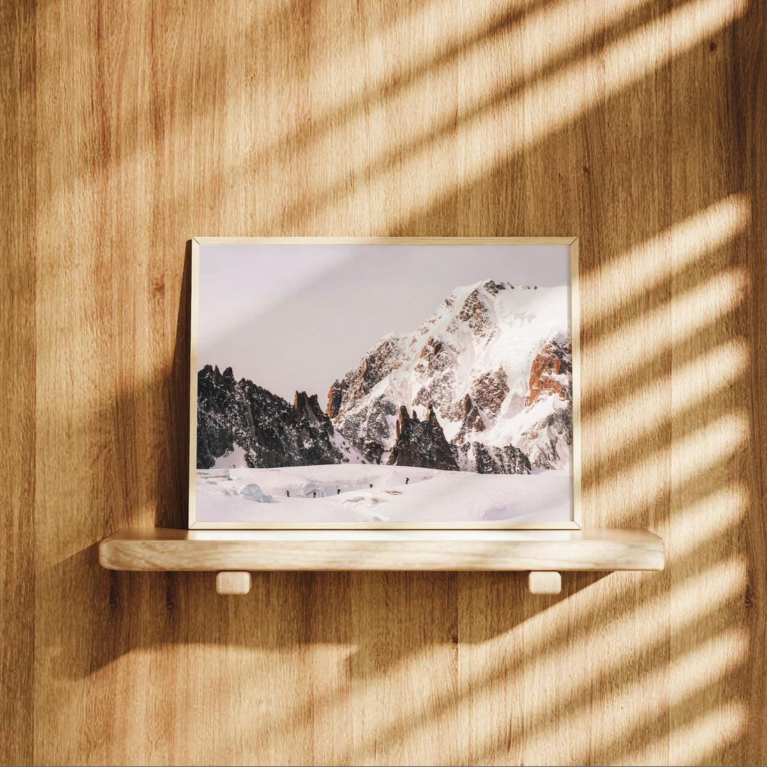 Mont Blanc glacier hiking print capturing skiers trekking through the legendary Vallée Blanche snowfield at sunrise.