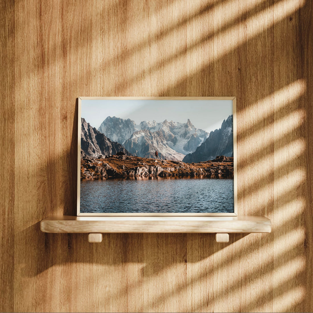 Mont Blanc hiker wall art print showing a lone figure against rugged alpine terrain and glacier peaks.