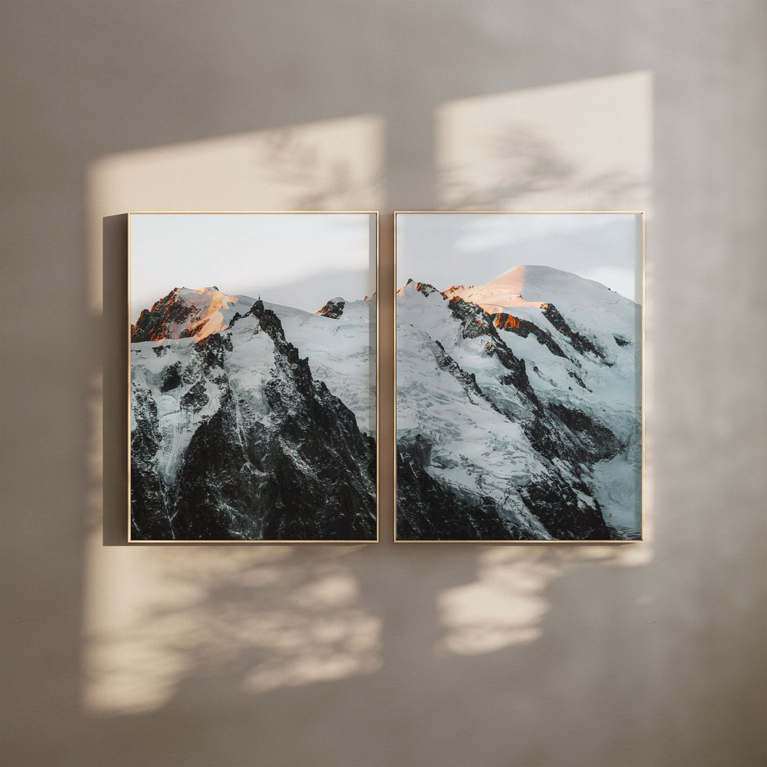Framed photograph of Mont Blanc Massif with golden light on the snowy peaks.