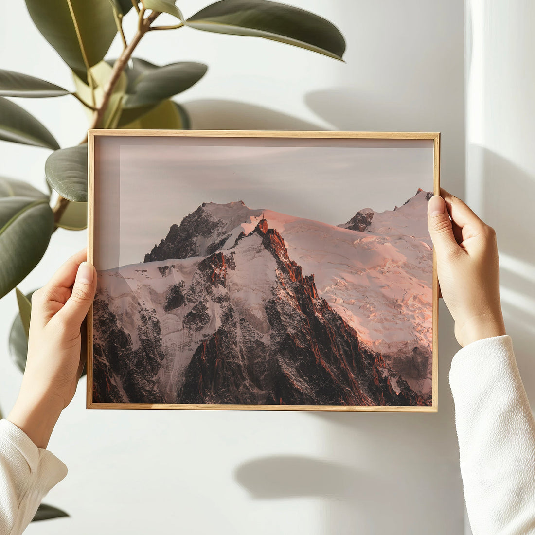 Dramatic photo print of the Mont Blanc Massif during golden hour, highlighting the snowy summit ridges.