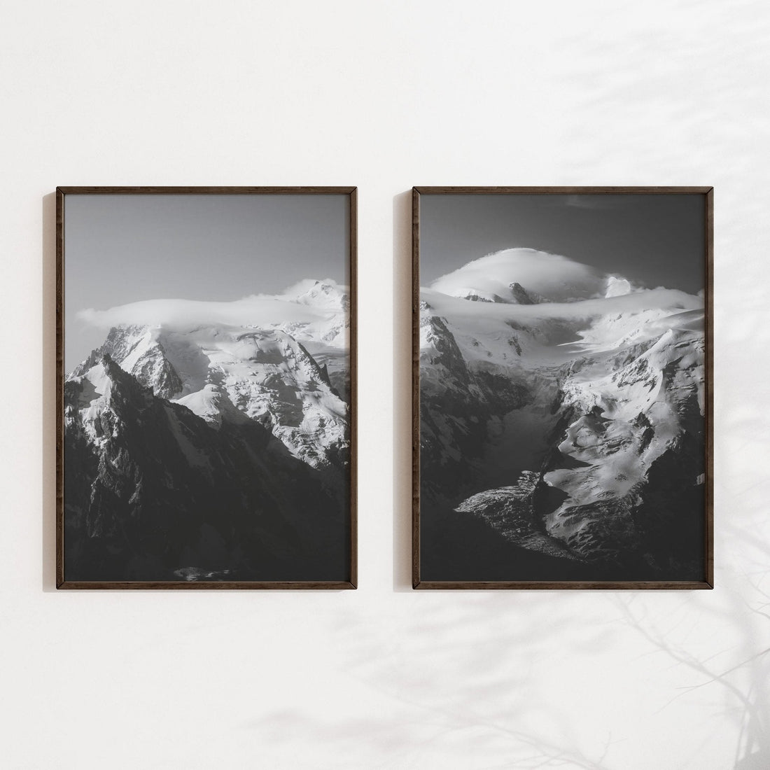 Minimalist Mont Blanc Massif wall art in monochrome style with wooden frames and a clean aesthetic.
