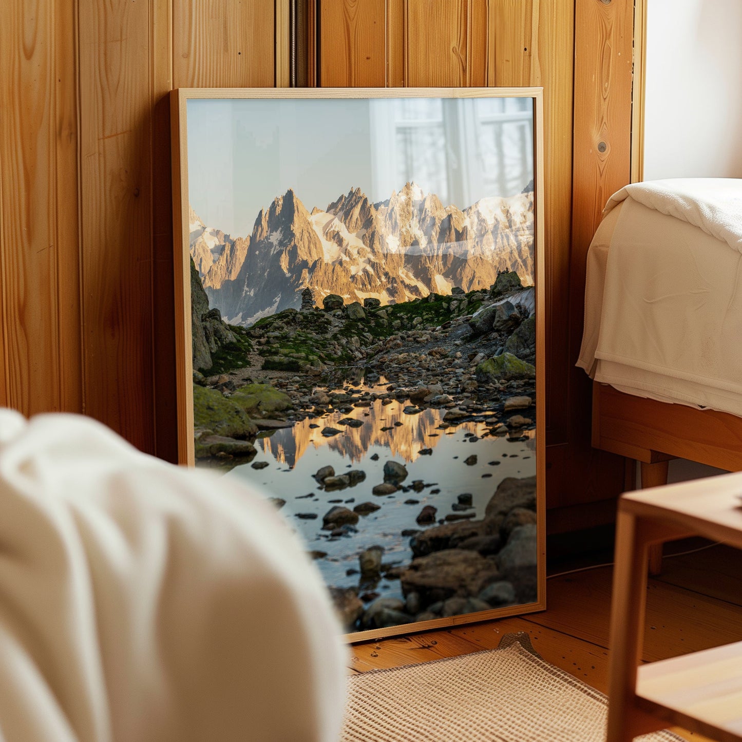Beautiful photography art of the Mont Blanc Massif, showcasing sharp peaks and a pristine water reflection.